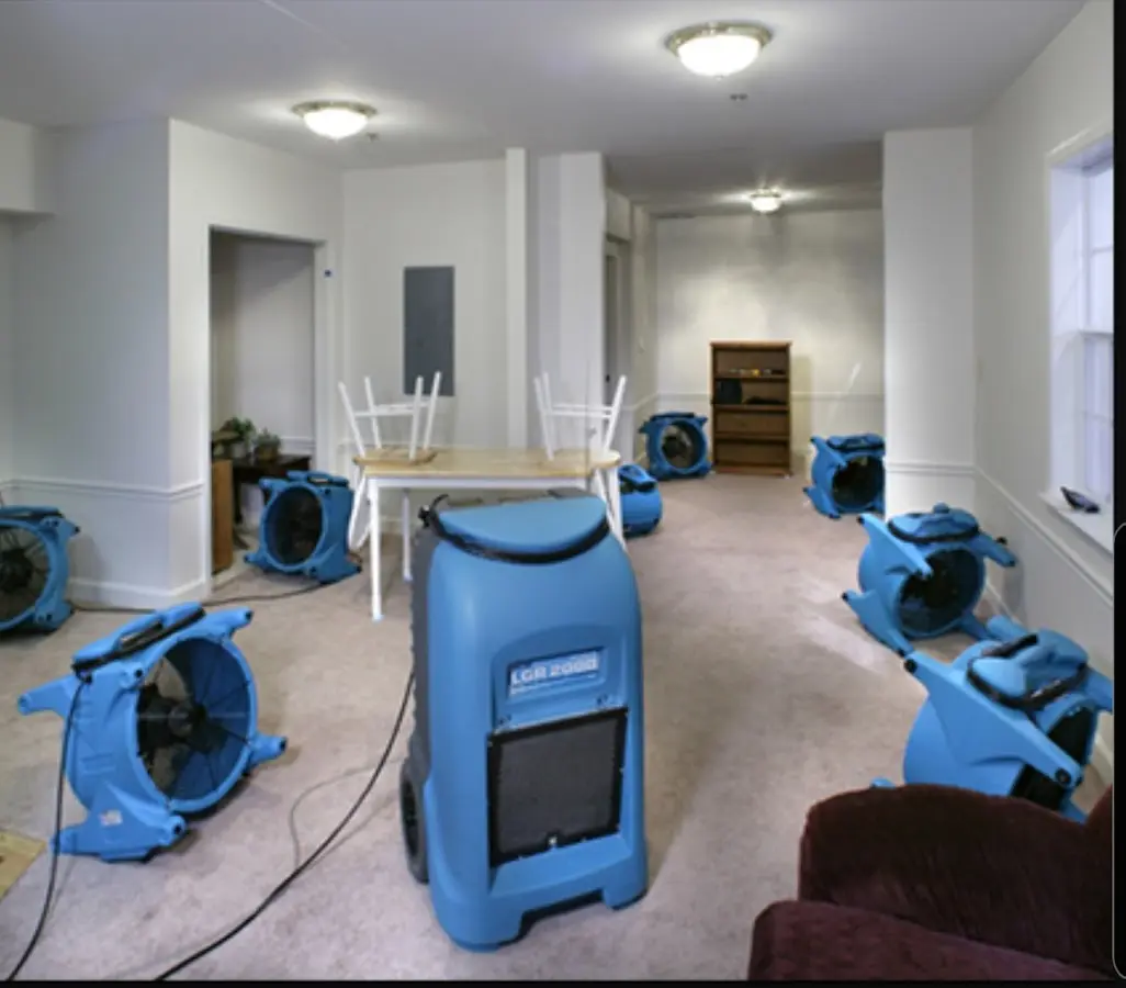 Air movers and dehumidifier setup for Water Damage Restoration in Closter